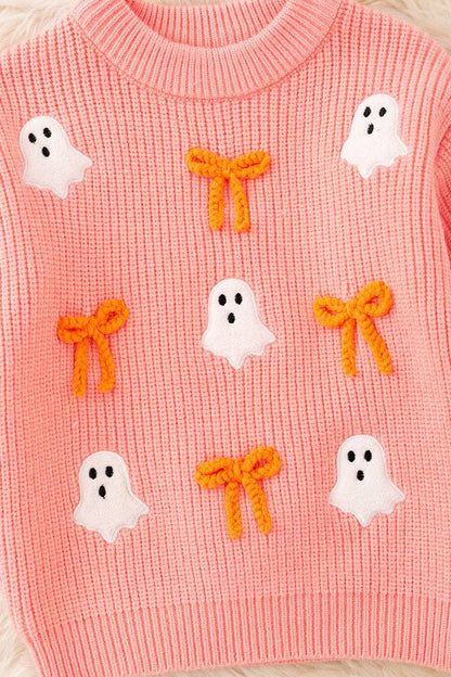 Ghost applique and orange embroidered bow on Coral knitted sweater.
