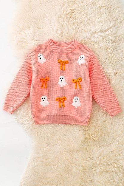 Ghost applique and orange embroidered bow on Coral knitted sweater.