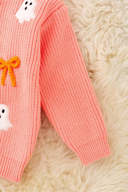 Ghost applique and orange embroidered bow on Coral knitted sweater.